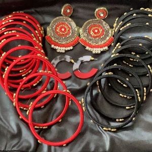 Various throwback Sassy Jones bangles and 2 pairs of earrings